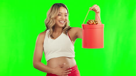 Surprise,-gift-and-happy-pregnant-woman-on-green