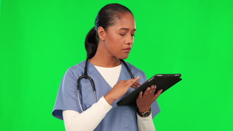 Tablet,-green-screen-and-female-nurse-in-studio