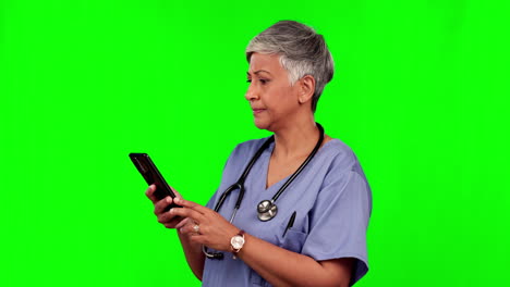 Nurse-woman,-phone-and-texting-by-green-screen