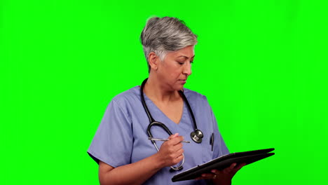 Nurse,-senior-woman-and-writing-on-green-screen
