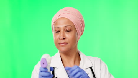 Doctor,-woman-and-thermometer-by-green-screen