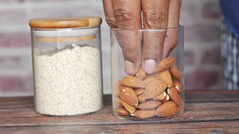 Almond-powder-and-almond-in-a-jar-on-table