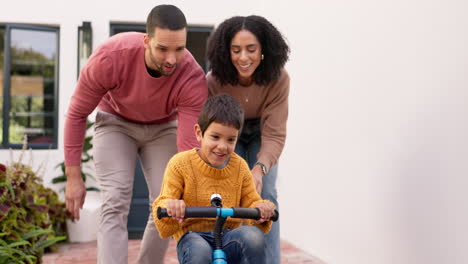 Parents,-kid-and-learning-to-ride-a-bike