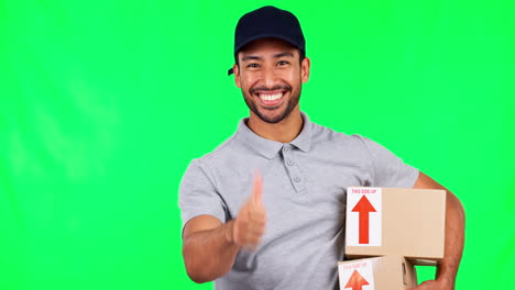 Asian-man,-boxes-and-thumbs-up-on-green-screen
