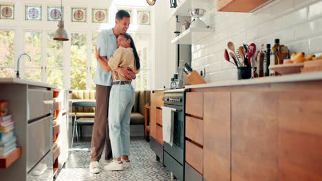 Love,-dance-and-a-happy-couple-in-a-kitchen