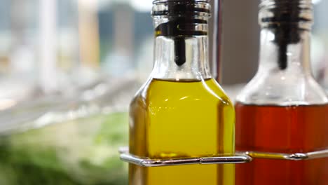 Close-up-of-olive-bottle-in-kitchen-,