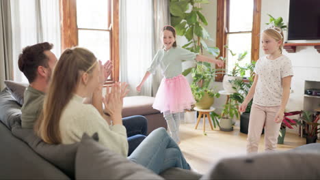 Parents-clapping-for-their-kids-in-the-living-room