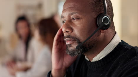 Headache,-call-center-and-a-man-with-a-headset