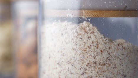 Close-up-of-almond-powder-in-a-jar