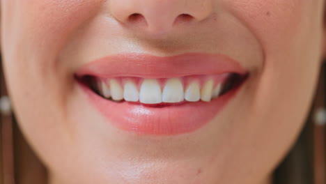 Happy,-teeth-and-closeup-smile-of-a-woman