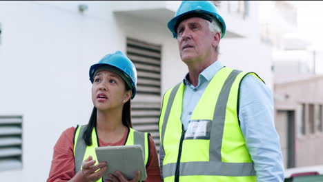 Construction,-team-and-woman-check-with-tablet