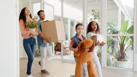 Happy-family,-box-and-moving-in-new-home-for-real