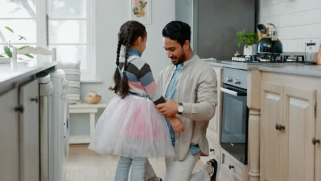 Ballet,-hug-and-father-with-daughter-in-kitchen