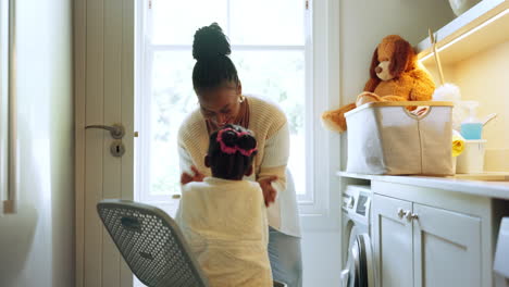 Black-mother,-child-and-hide-in-laundry-basket