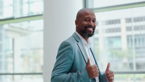 Entrepreneur,-black-man-and-thumbs-up-in-office