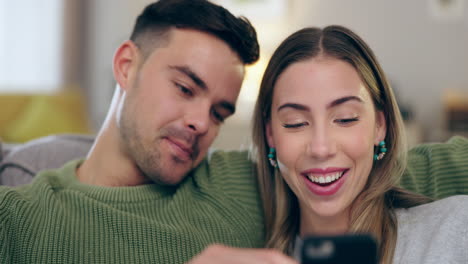 Laugh,-funny-and-a-couple-with-a-phone-on-home