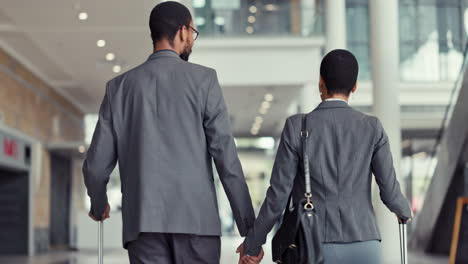 Back,-travel-and-a-black-couple-holding-hands
