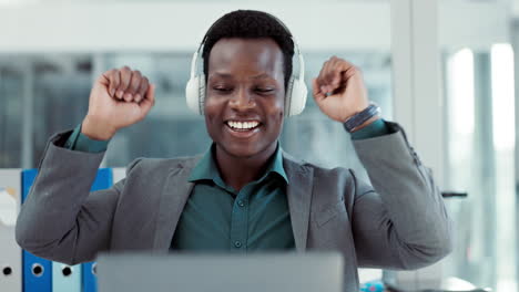 Celebrate,-businessman-and-laptop-with-music
