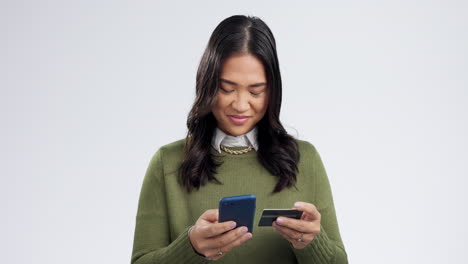 Woman,-smartphone-and-credit-card