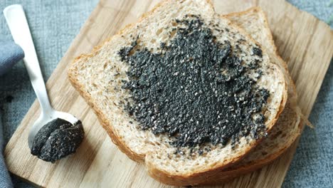 Black-sesame-spread-on-a-bread-,