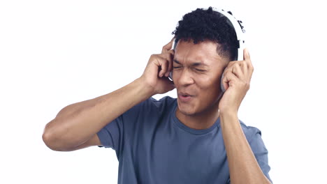 Singing,-man-and-dance-with-headphones-in-studio
