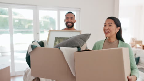 Happy-couple,-box-and-moving-in-new-home-together
