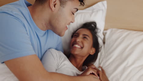 Laugh,-tickling-and-couple-in-bed-in-morning