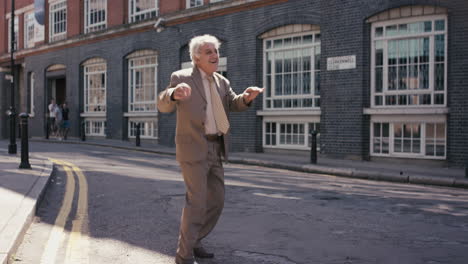 Contemporary-funky-elderly-man-street-dancer-dancing-freestyle-in-the-city