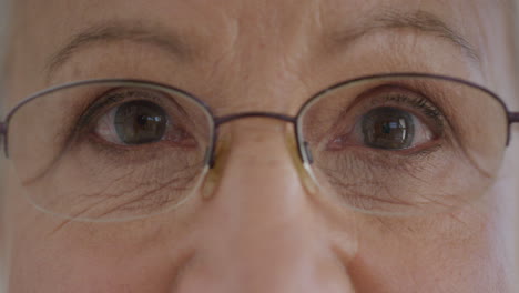 Portrait-beautiful-mature-old-woman-eyes-blinking