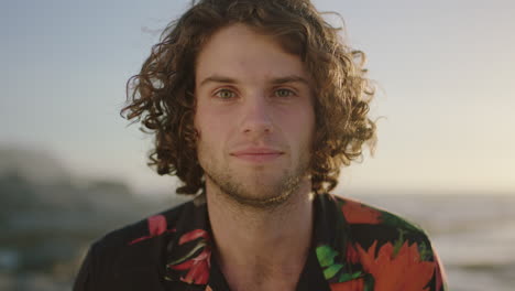 close-up-portrait-of-attractive-young-man-smiling-cheerful--wearing-aloha-shirt-at-sunset