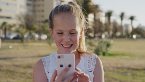 portrait-happy-blonde-caucasian-girl-using-smartphone-enjoying-playing-mobile-games-smiling-cheerful-satisfaction-on-warm-sunset-park