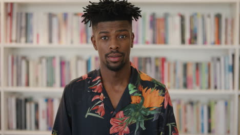 portrait-handsome-african-american-man-student-looking-confident-young-black-male-wearing-hawaiian-shirt-funky-hairstyle-slow-motion