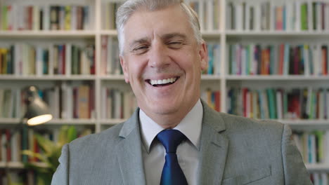 close-up-portrait-of-serious-caucasian-businessman-boss-laughing-cheerful-enjoying-corporate-lifestyle-wearing-suit-in-library-study-office