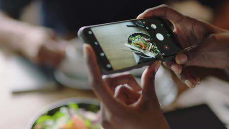business-woman-in-cafe-using-smartphone-taking-photo-of-healthy-salad-sharing-vegetarian-lifestyle-on-social-media-enjoying-relaxing-restaurant-close-up-hands