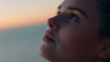 close-up-beautiful-woman-on-mountain-top-looking-up-feeling-relaxed-sunrise-feeling-relaxed-enjoying-mindfulness