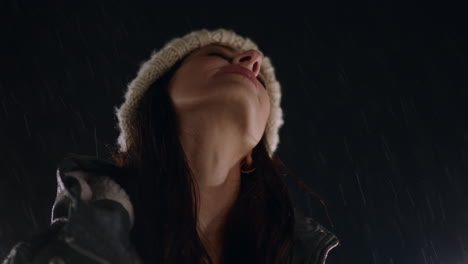 beautiful-young-woman-standing-in-rain-enjoying-gentle-raindrops-touching-skin