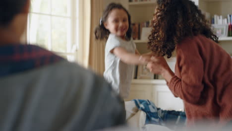 cute-little-girl-dancing-with-mother-at-home-family-having-fun-parents-mom-and-dad-playing-with-daughter-at-home-on-weekend-4k