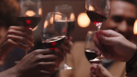happy-group-of-friends-making-toast-having-fun-drinking-wine-socializing-hanging-out-at-pub-chatting-sharing-celebration-enjoying-evening-reunion-gathering