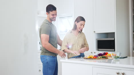 Cooking,-happy-and-couple-in-the-kitchen-together