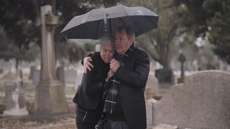 Support,-death-or-old-couple-in-cemetery