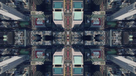 Top-down-shot-of-traffic-in-downtown-streets-in-large-city.-Abstract-computer-effect-digital-composed-footage.