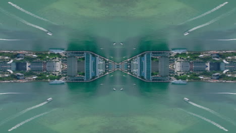 Symmetrical-composition-of-modern-buildings-on-waterfront-and-boats-passing-on-water-surface.-Abstract-computer-effect-digital-composed-footage