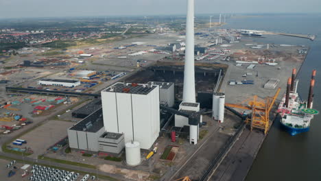 Look-up-aerial-view-over-the-city-of-Esbjerg-power-station.-Birds-eye-revealing-the-chimney-of-the-coal-and-oil-fueled-power-plant