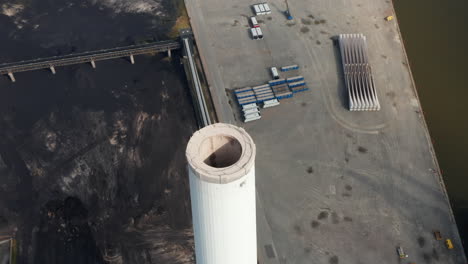 Aerial-flight-orbiting-around-the-chimney-of-Esbjerg-Power-Station-in-Denmark.-The-chimney-of-this-station-that-will-be-no-carbon-by-2023-is-the-tallest-in-Scandinavia