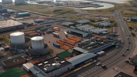 Aerial-view-of-industrial-oil-storage-tanks-in-Esbjerg,-Denmark-harbor.-Port-Esbjerg-is-base-for-all-oil-and-gas-fields-in-North-Sea