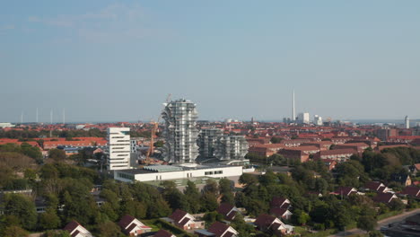 Aerial-view-of-the-construction-of-Esbjerg-Tower,-an-estate-consisting-in-three-towers-that-will-contain-students-homes-and-hotel-apartments