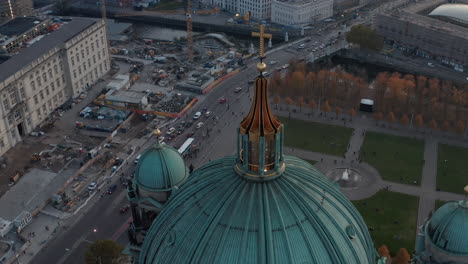 Orbit-footage-around-dome-of-Berlin-Cathedral.-Aerial-view-of-Lustgarten-park-and-busy-street-around-Berlin-Palace.-Berlin,-Germany.
