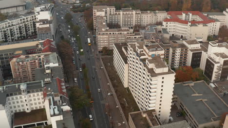High-angle-view-of-wide-street-leading-through-urban-neighbourhood.-Tall-buildings-along-busy-multilane-road.-Berlin,-Germany