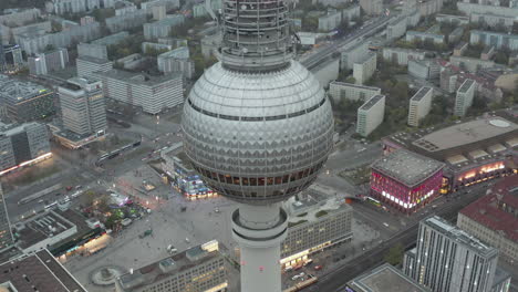 AERIAL:-Close-Up-of-Berlin-Germany-TV-Tower-Alexanderplatz-at-Daylight-with-cloudy-weather