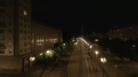 Aerial-View-of-Empty-Karl-Marx-Allee-Street-at-Night-in-Berlin,-Germany-during-COVID-19-Coronavirus-Pandemic